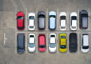 Arial view of parked cars in different colours