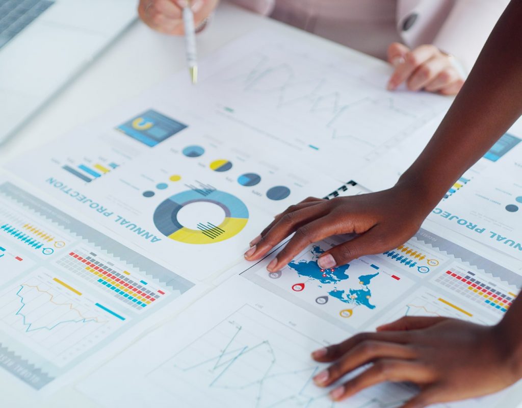 People reviewing business report