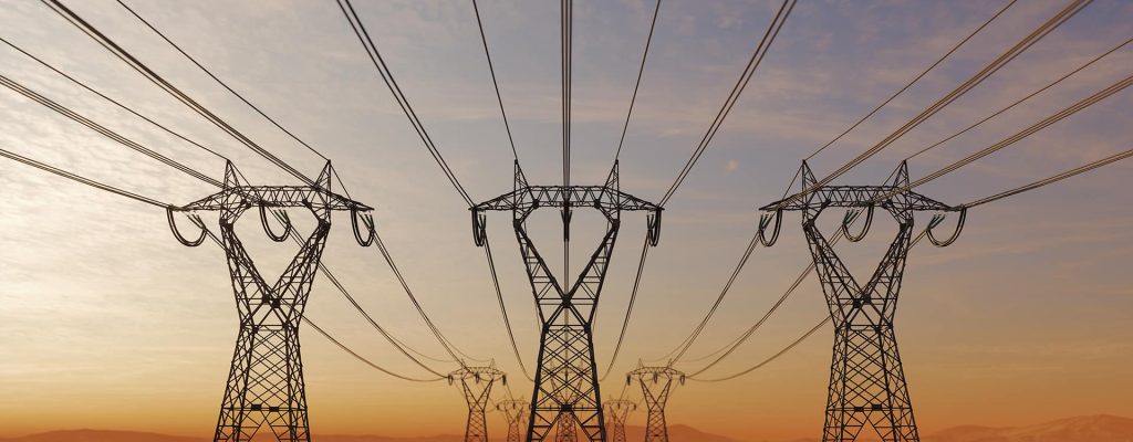 High Voltage Electric Power Lines At Sunset